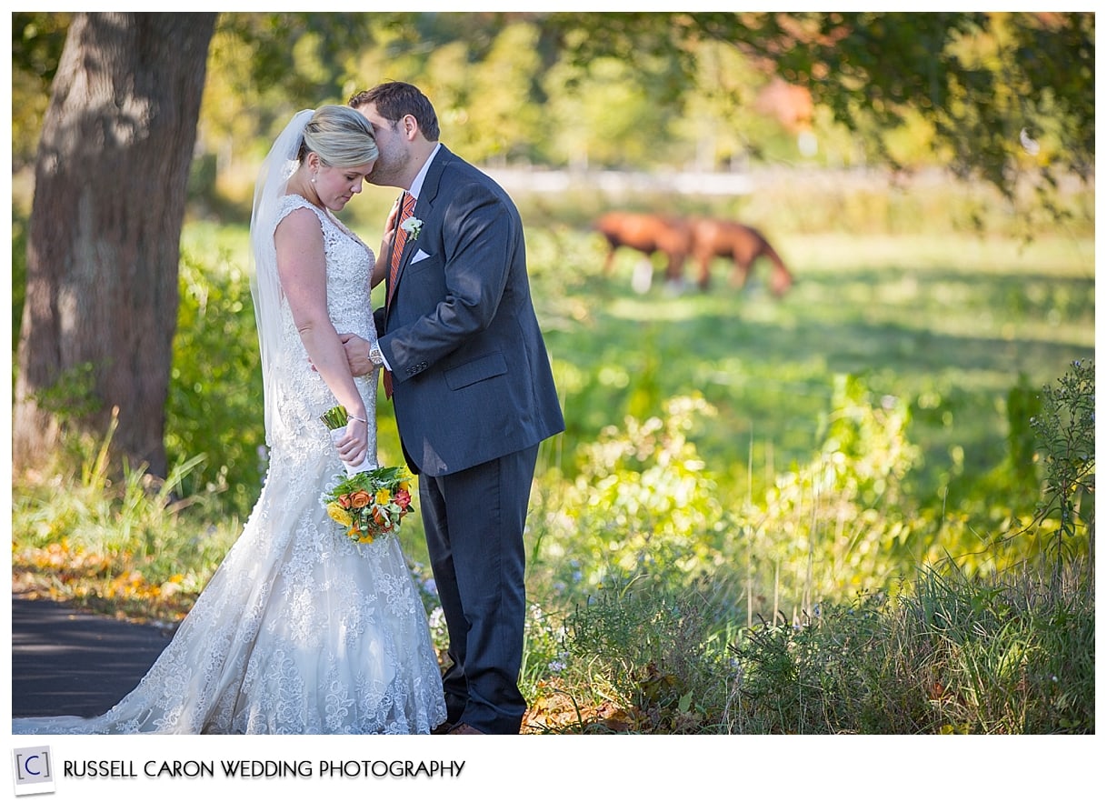 Bride and groom next to field, Suzi and Tyler, 2015 best wedding blog posts, by Kennebunkport Maine wedding photographers, Russell Caron Wedding Photography