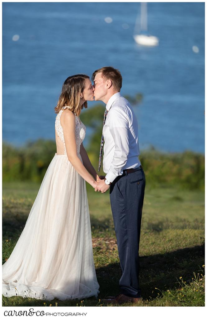 bride and groom's first kiss during their sweet Portland Maine elopement