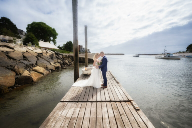 bride and groom on a dock